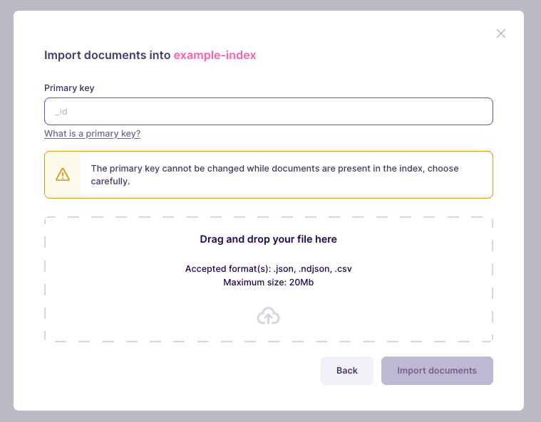 Another modal window with a large drag-and-drop area. It indicates a file named "movies.json" will be uploaded